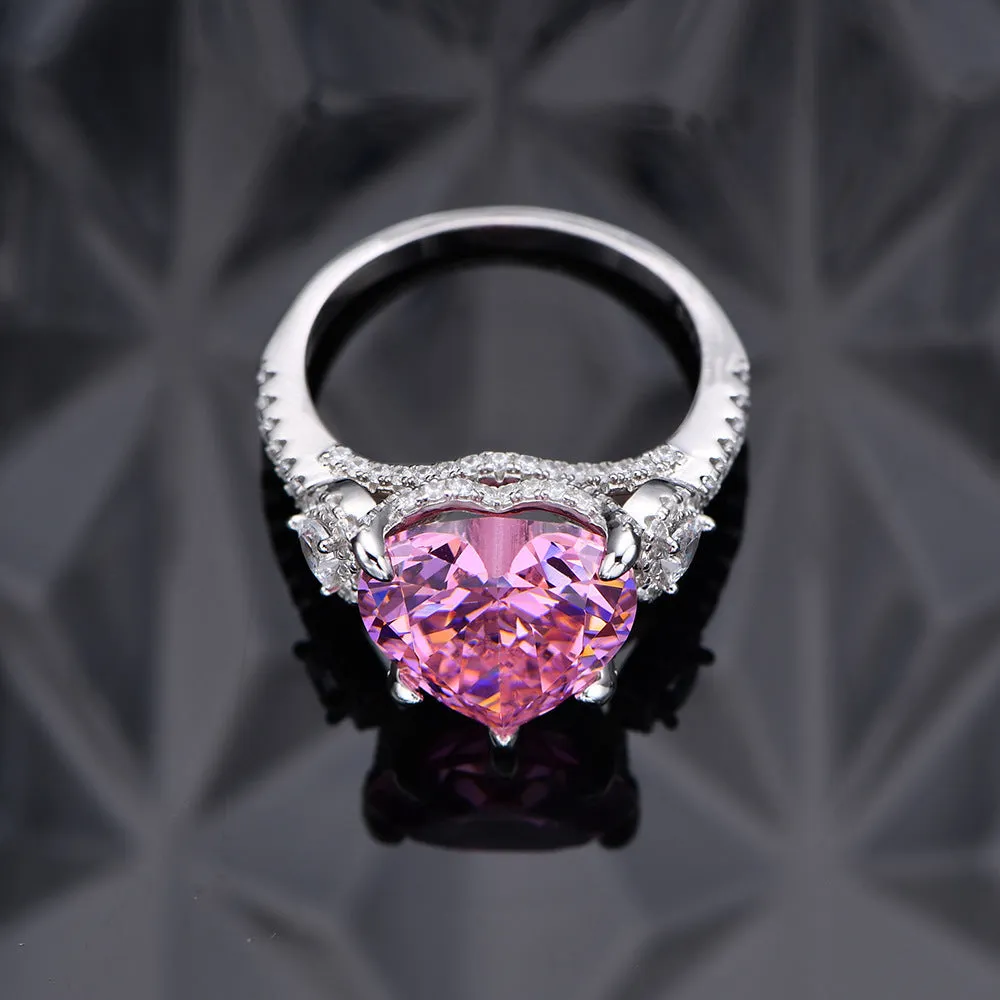 Heart-shaped diamond ring on white background, 925 silver band, open inlay setting