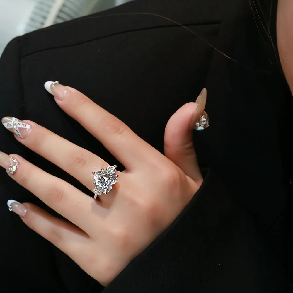Heart-shaped diamond ring on white background, 925 silver band, open inlay setting