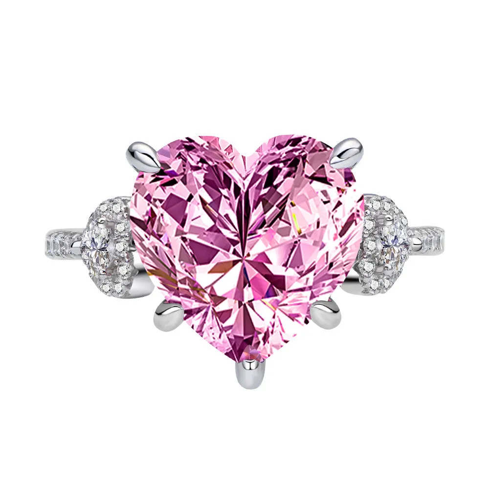 Heart-shaped diamond ring on white background, 925 silver band, open inlay setting