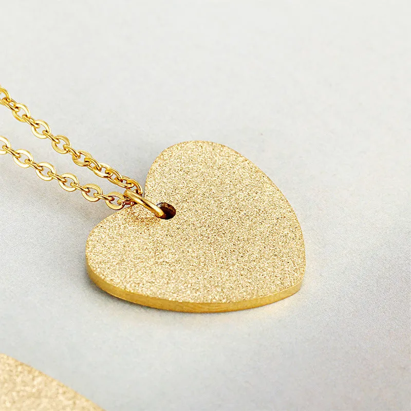 Geometric heart-shaped titanium steel necklace in silver colour with minimalist design