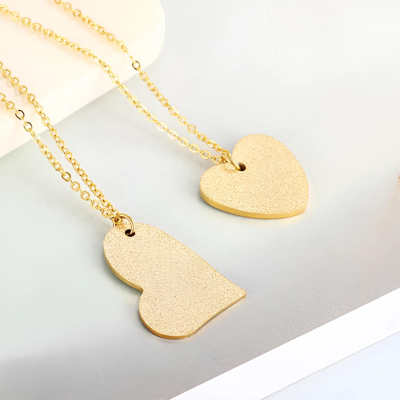 Geometric heart-shaped titanium steel necklace in silver colour with minimalist design