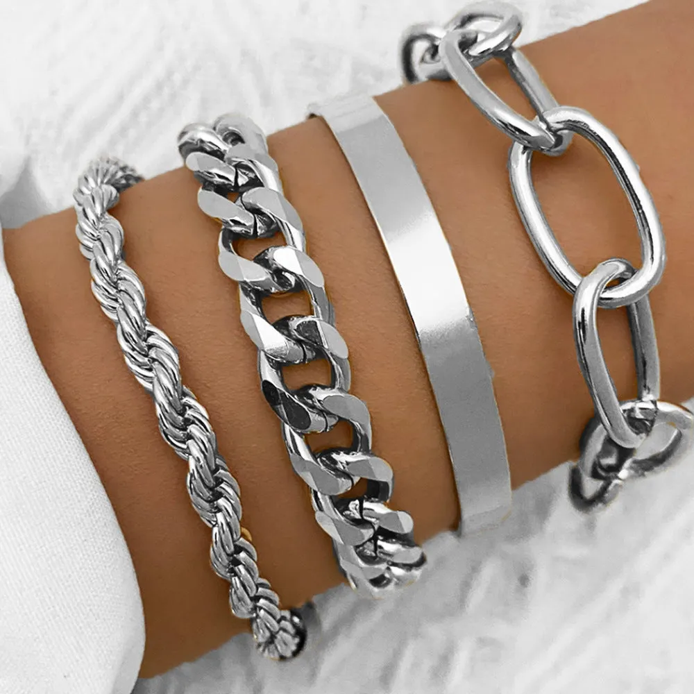 Set of 6 women's stretch bracelets with natural glass stones and gold beads arranged on a white surface