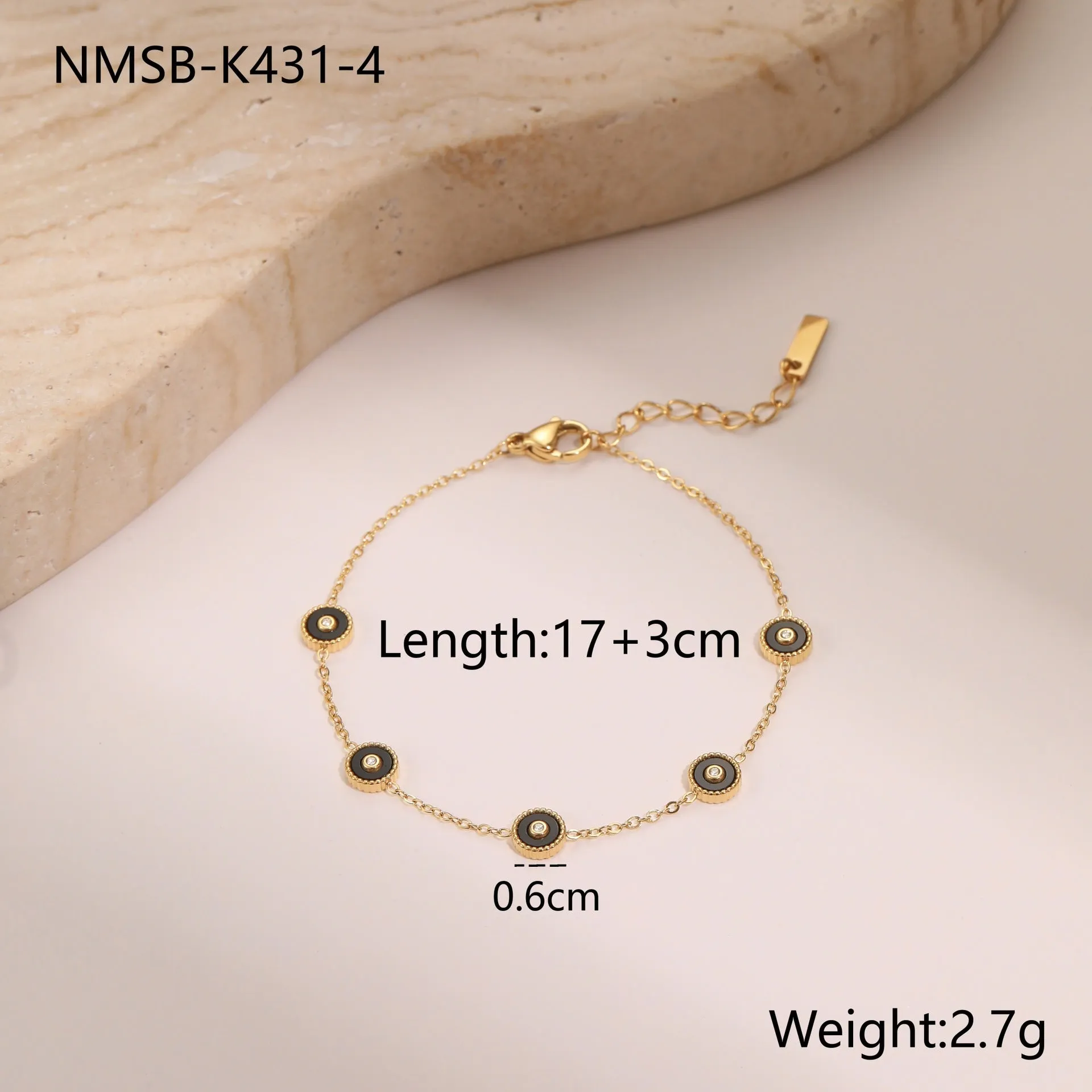 Women's stainless steel bracelet with 18K gold plating and geometric fritillary charm, includes matching necklace