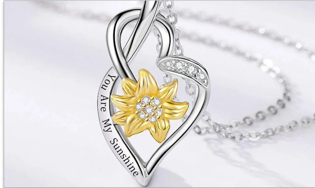 Silver sunflower pendant necklace on display, made from environmentally friendly alloy with electroplated finish