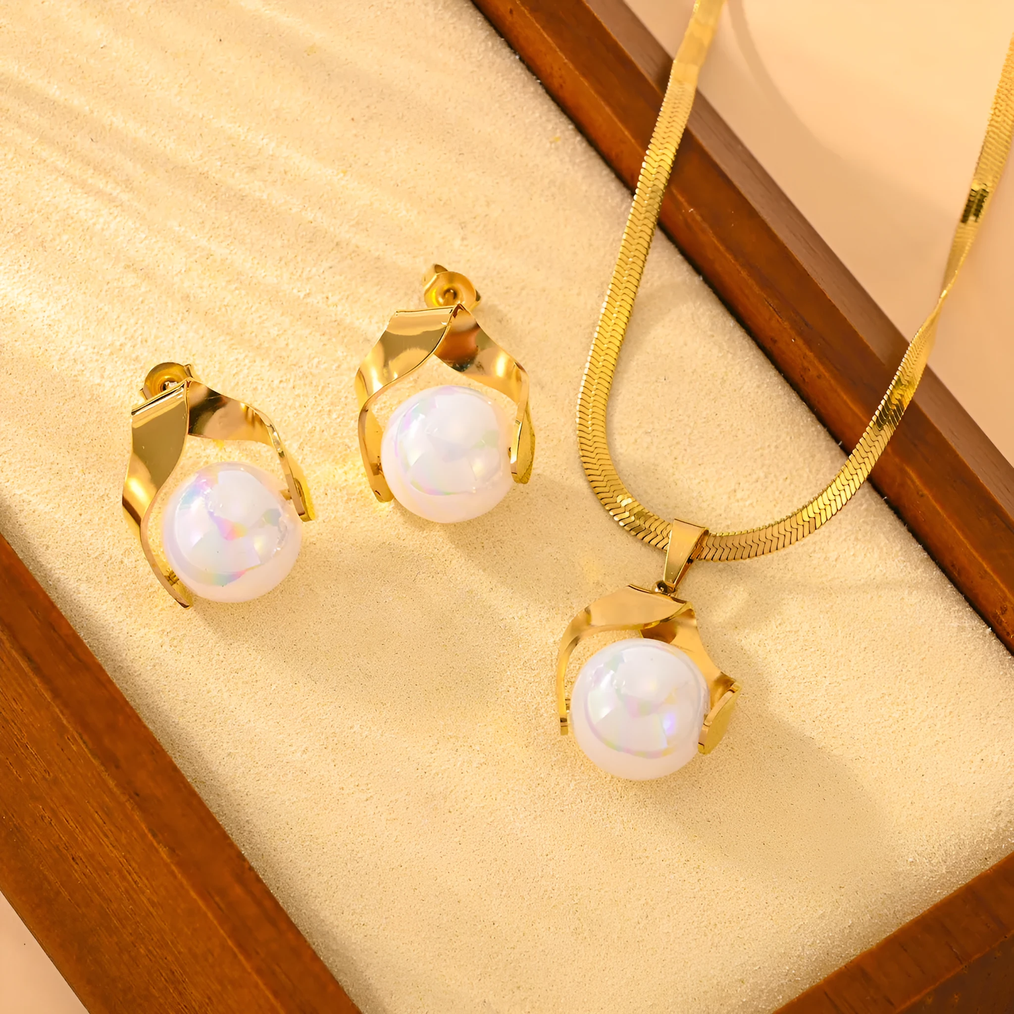 Fashion lady pearl earrings set in titanium steel with electroplating love heart water drop bell shapes, including necklace and stud earrings