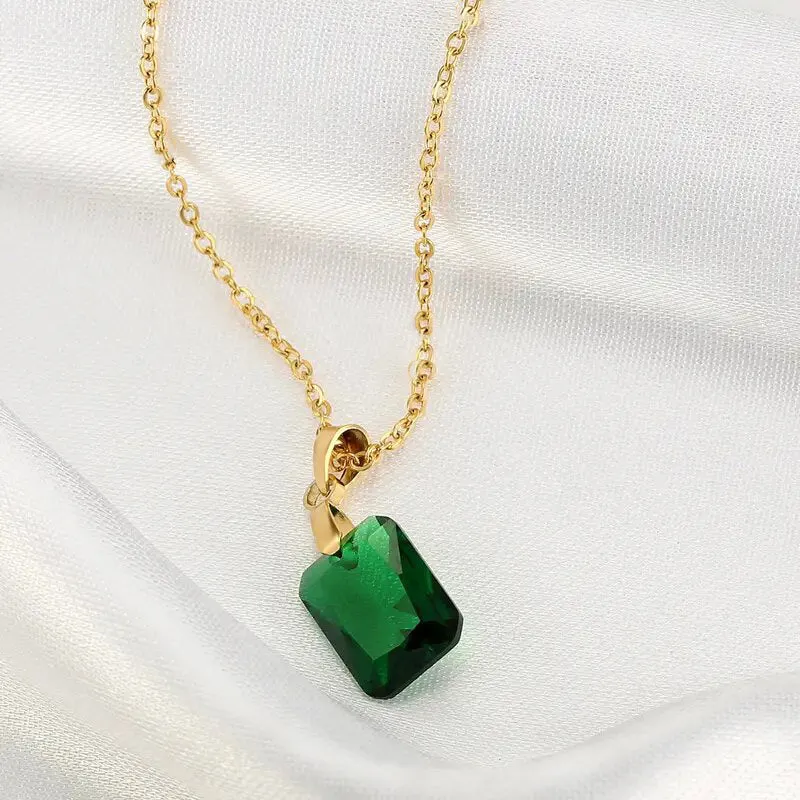 Copper geometric rectangular pendant necklace in XL1006 green on an O-ring chain.