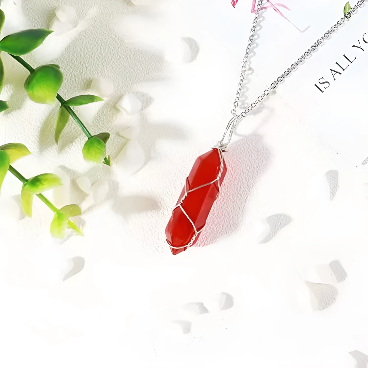 Red crystal hexagonal prism pendant necklace with copper wire winding on a water wave chain