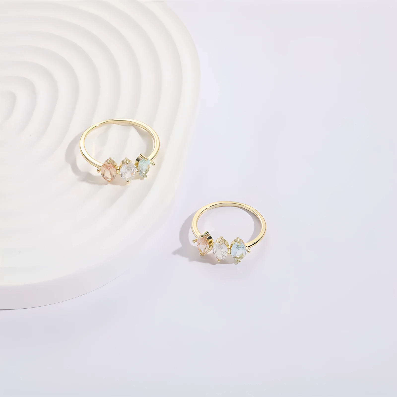 Mother's Day birthstone ring with geometric triangle design and horse eye tricolour zircon stones in 14k gold colour