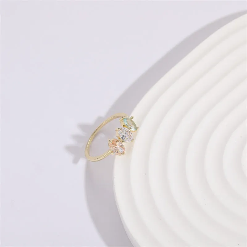 Mother's Day birthstone ring with geometric triangle design and horse eye tricolour zircon stones in 14k gold colour