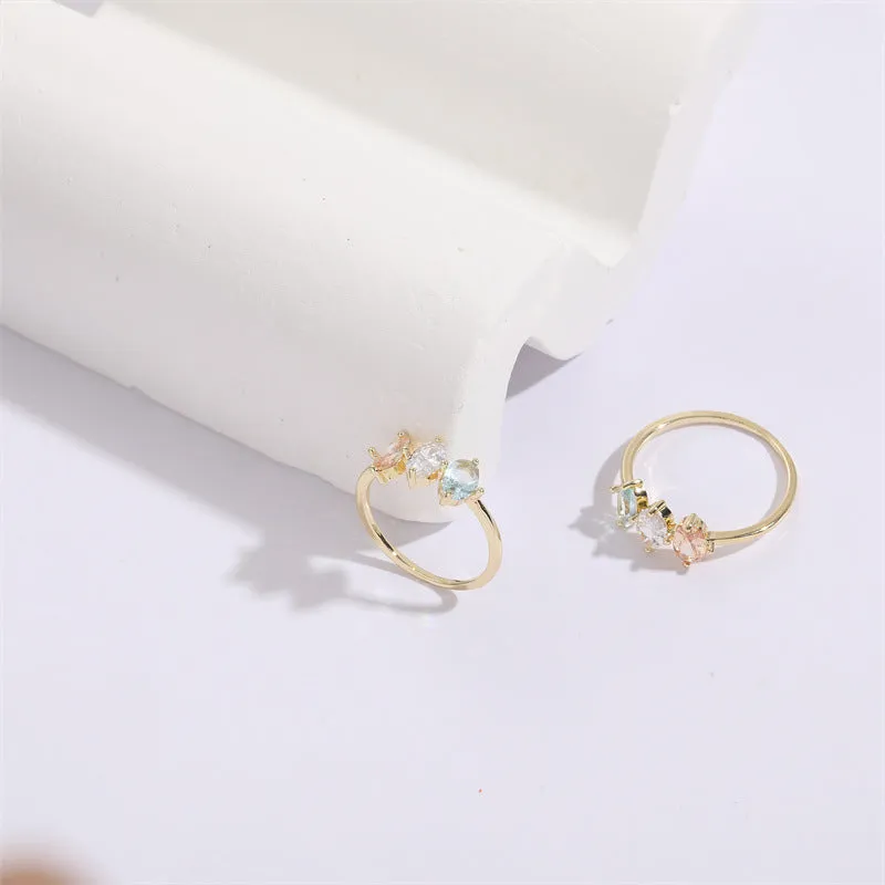 Mother's Day birthstone ring with geometric triangle design and horse eye tricolour zircon stones in 14k gold colour