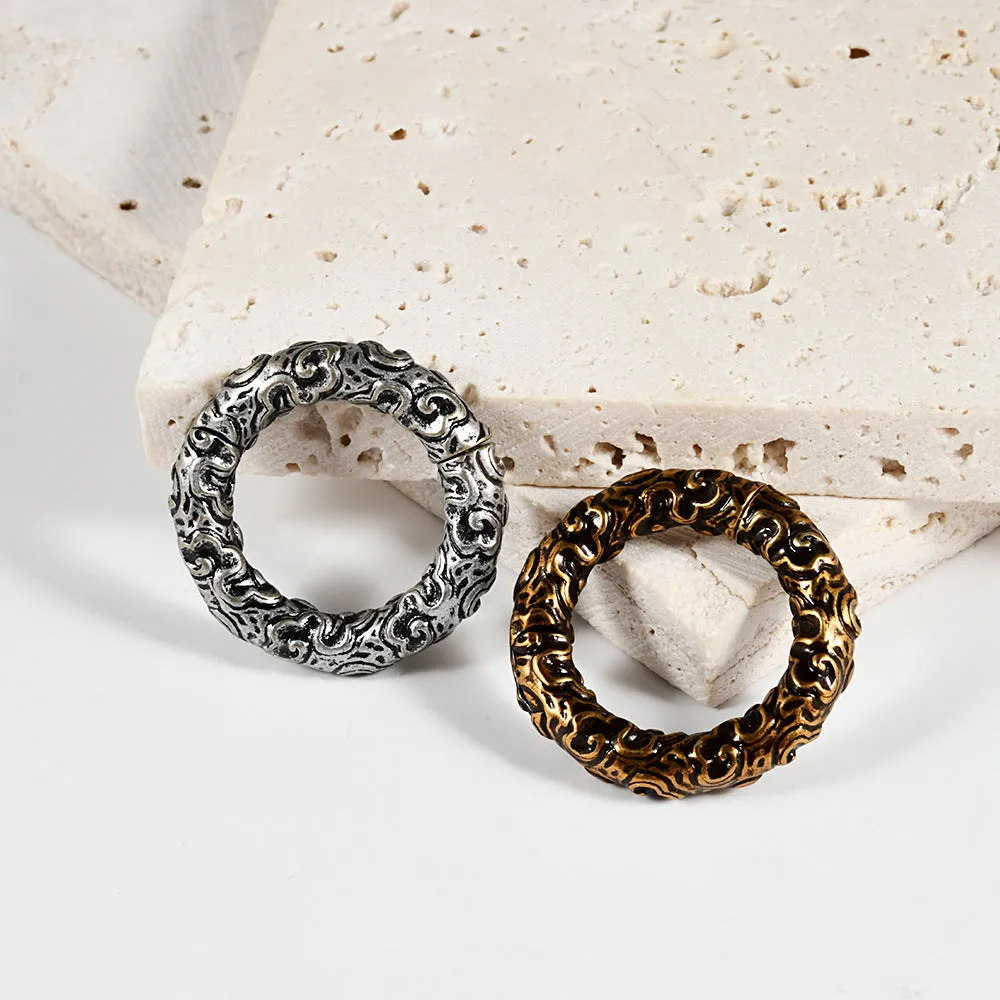 Stainless steel totem pattern earrings with geometric design and electroplated finish