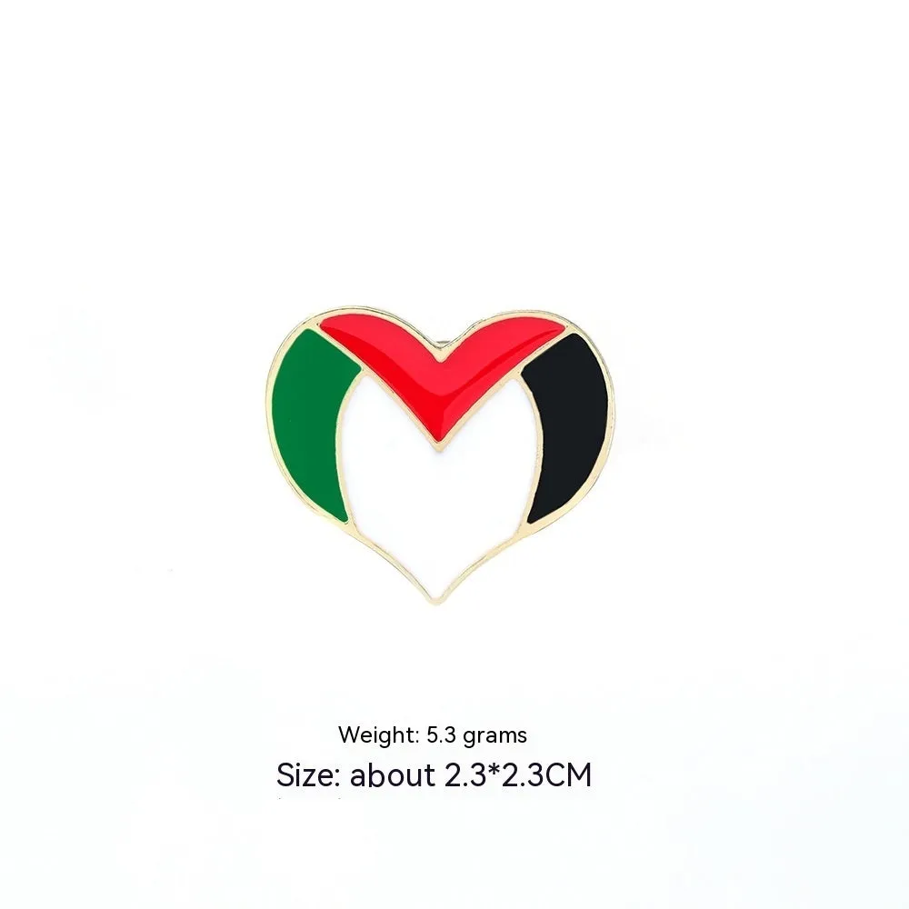 Square corrugated alloy brooch with Palestinian flag design on a neutral background