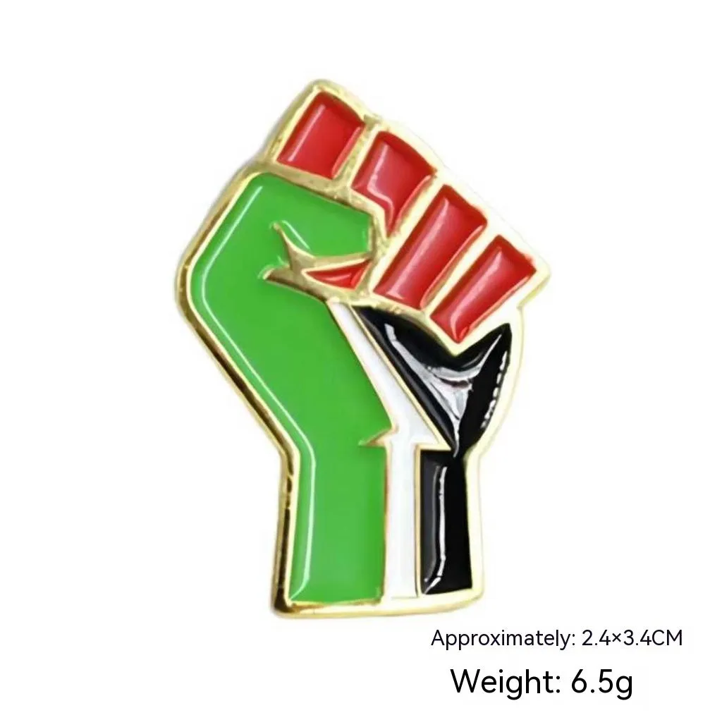 Square corrugated alloy brooch with Palestinian flag design on a neutral background