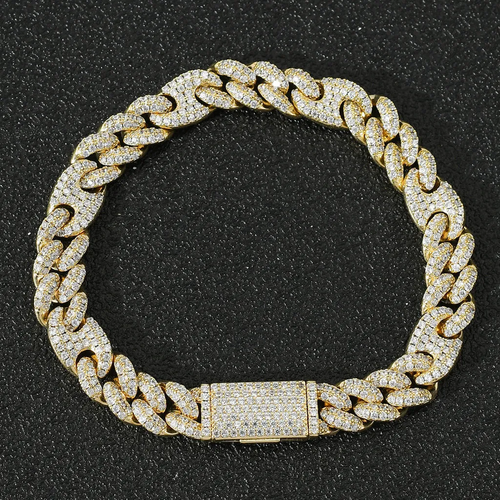 Gold copper Cuban chain bracelet with micro inlaid zircon on a surface