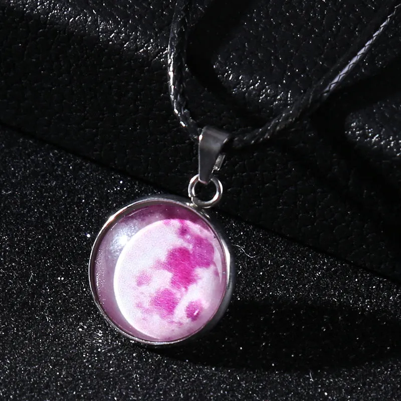 Luminous alloy necklace with a constellation-modelled glass pendant on an adjustable chain.