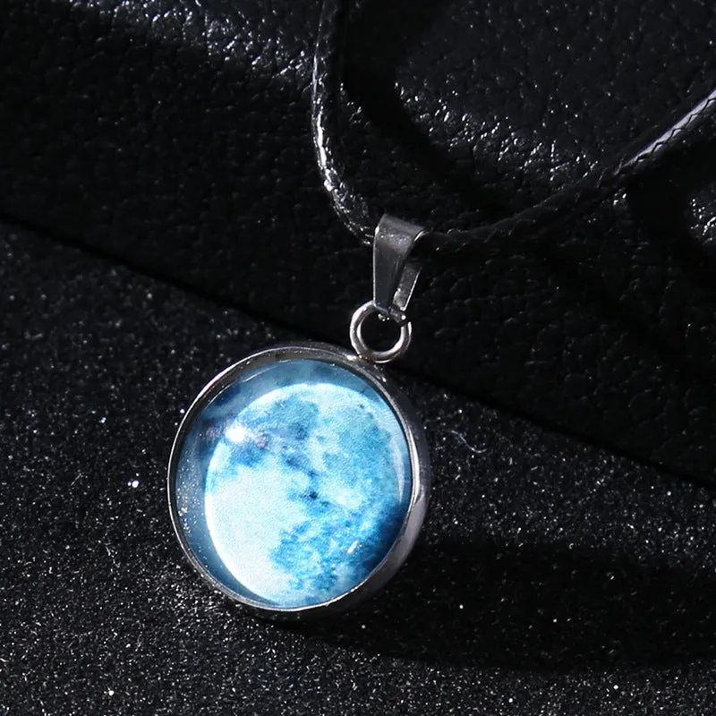 Luminous alloy necklace with a constellation-modelled glass pendant on an adjustable chain.
