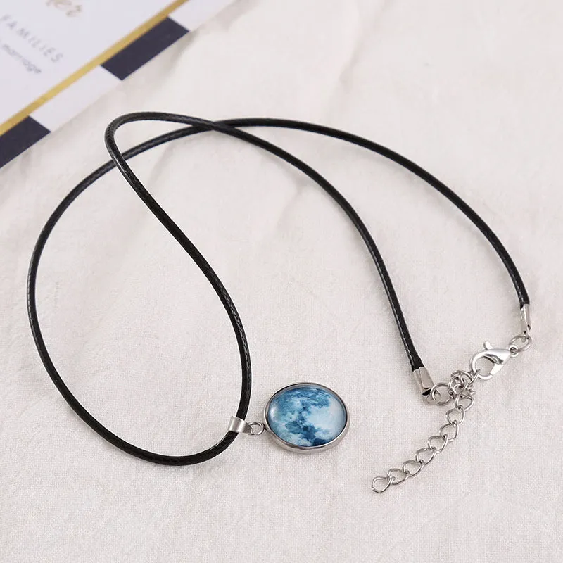Luminous alloy necklace with a constellation-modelled glass pendant on an adjustable chain.