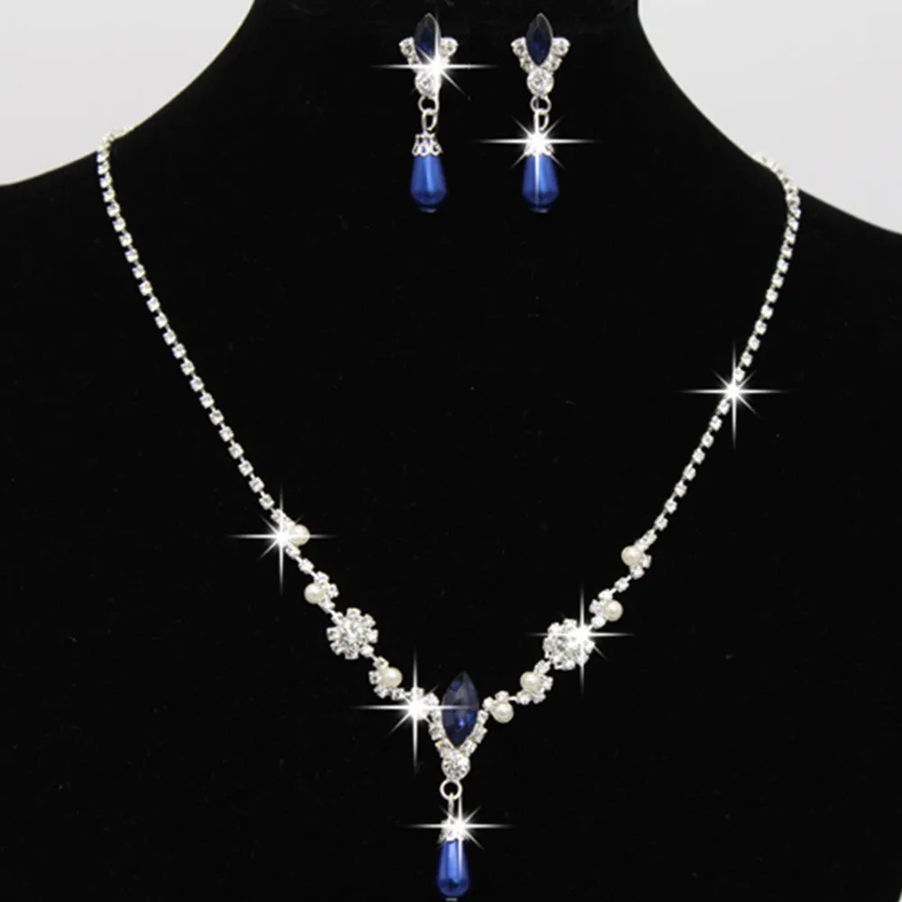 Drop pearl necklace and earrings set in white, blue, and pink for bridal and formal occasions