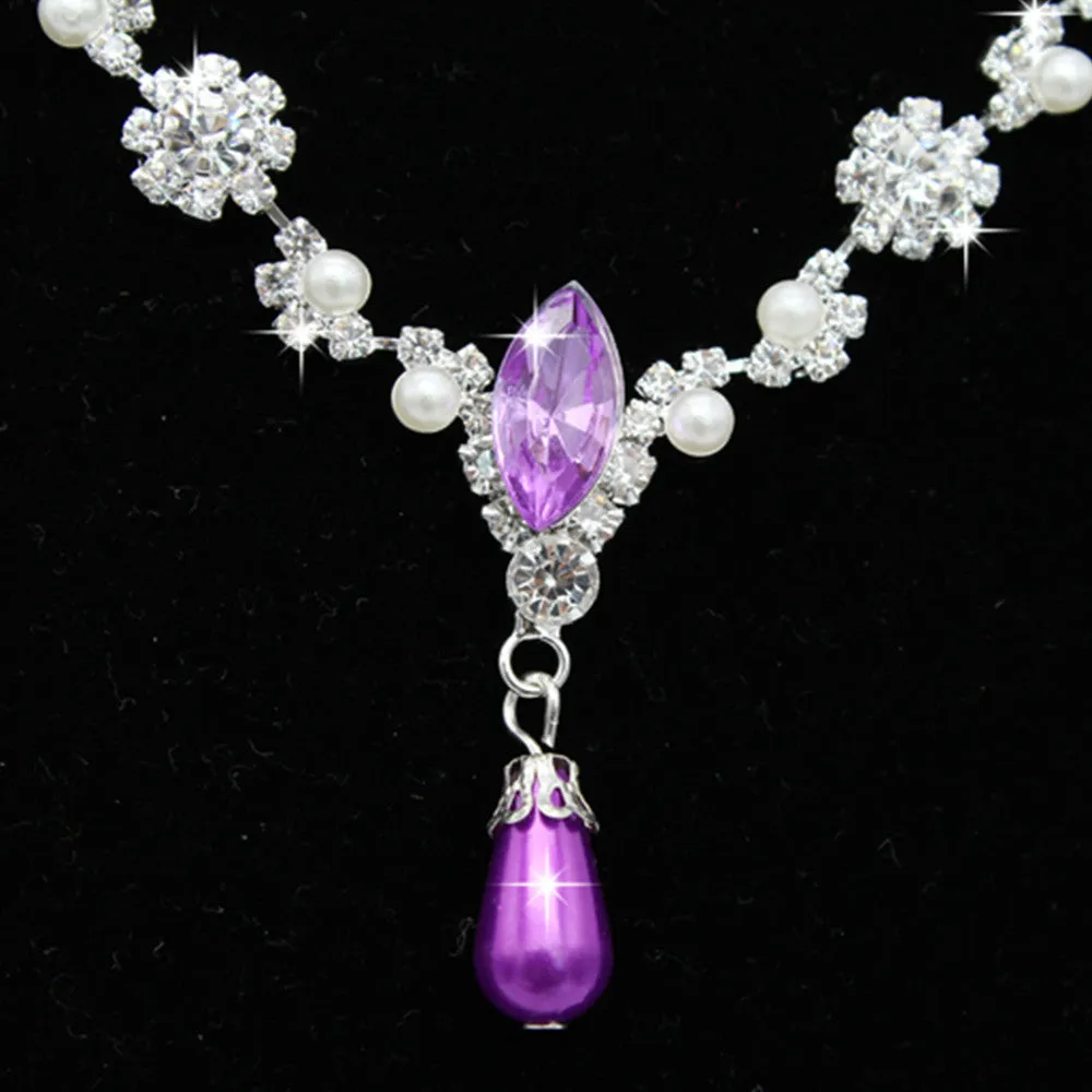 Drop pearl necklace and earrings set in white, blue, and pink for bridal and formal occasions