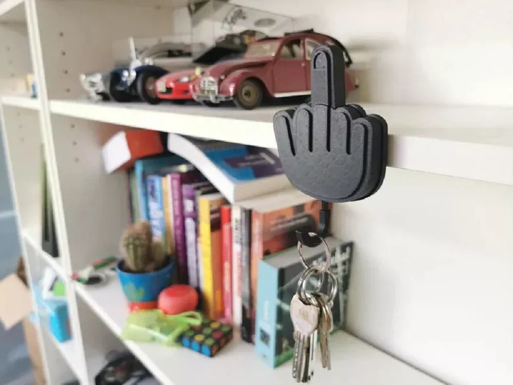 Wooden middle finger desk key hook with single hook design and 2kg capacity in modern minimalist style