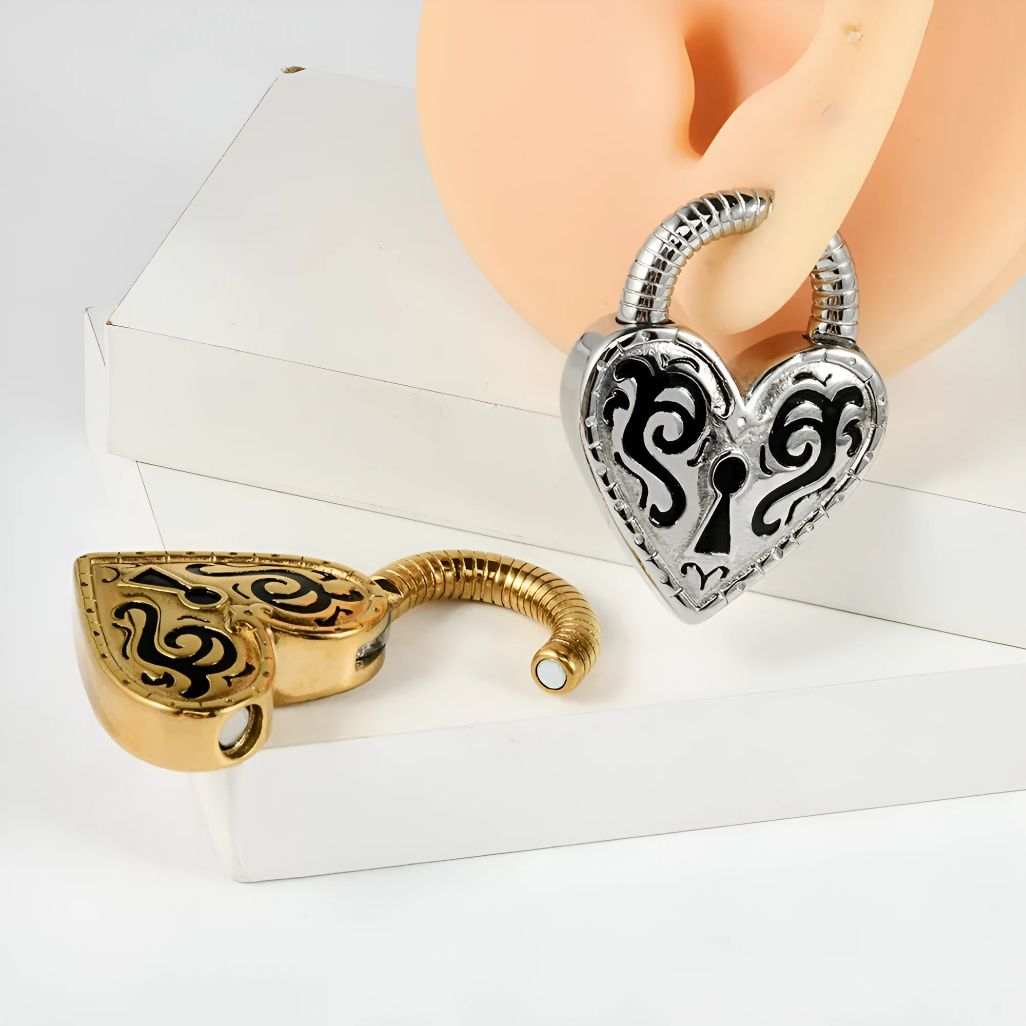 Heart-shaped stainless steel earrings with gold or steel colour electroplated finish