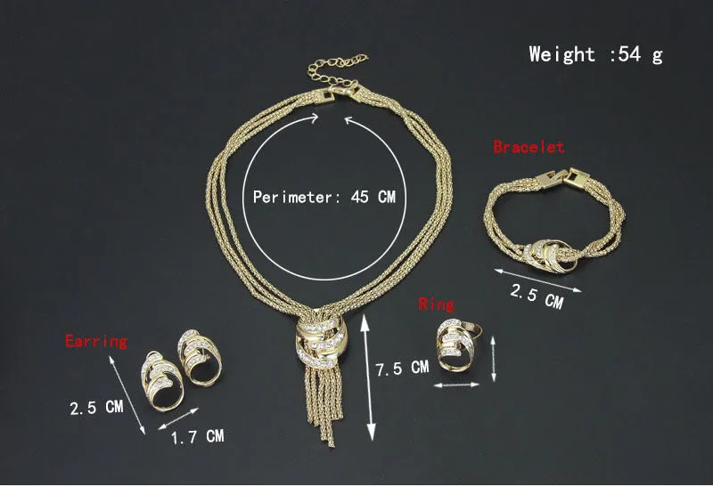 Gold alloy jewelry set with necklace, bracelet, earrings, and ring on a neutral background