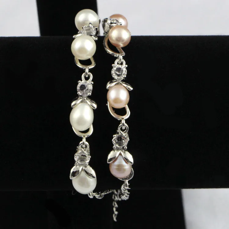 Freshwater pearl bracelet with Korean crown design alloy closure on display