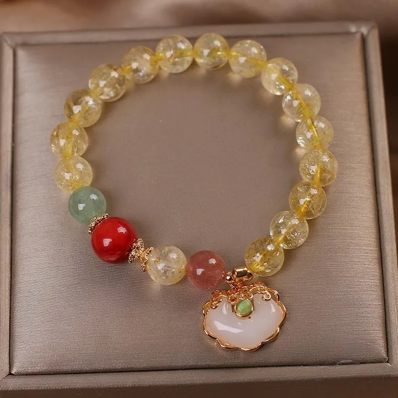 Women's bracelet with natural citrine jade ruyi pendant in yellow hair crystal colour on alloy band
