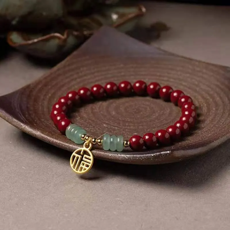 Traditional handmade gold cinnabar wave bracelet with copper bead accents in pumpkin or brand cinnabar colour options