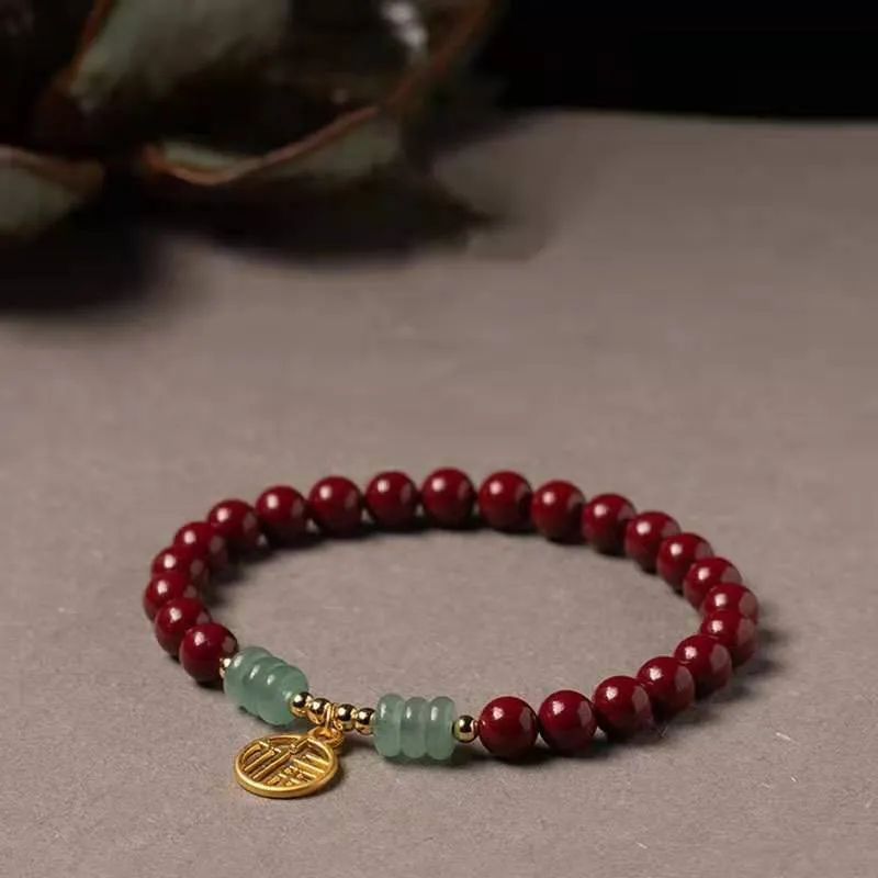 Traditional handmade gold cinnabar wave bracelet with copper bead accents in pumpkin or brand cinnabar colour options