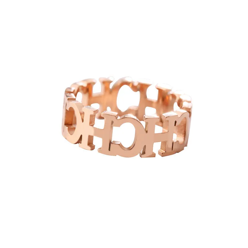 Gold titanium steel hollowed cut letter ring in unisex geometric Korean style, sizes 6-9