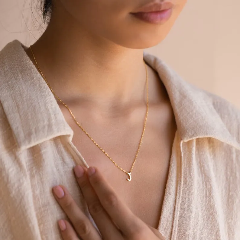 Stainless steel letter necklace with mixed gem inlaid pendant on an adjustable O-ring chain in silver finish