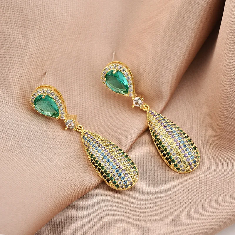 Copper drop shape earrings with inlaid zircon and gold-plated finish in 18K gold colour