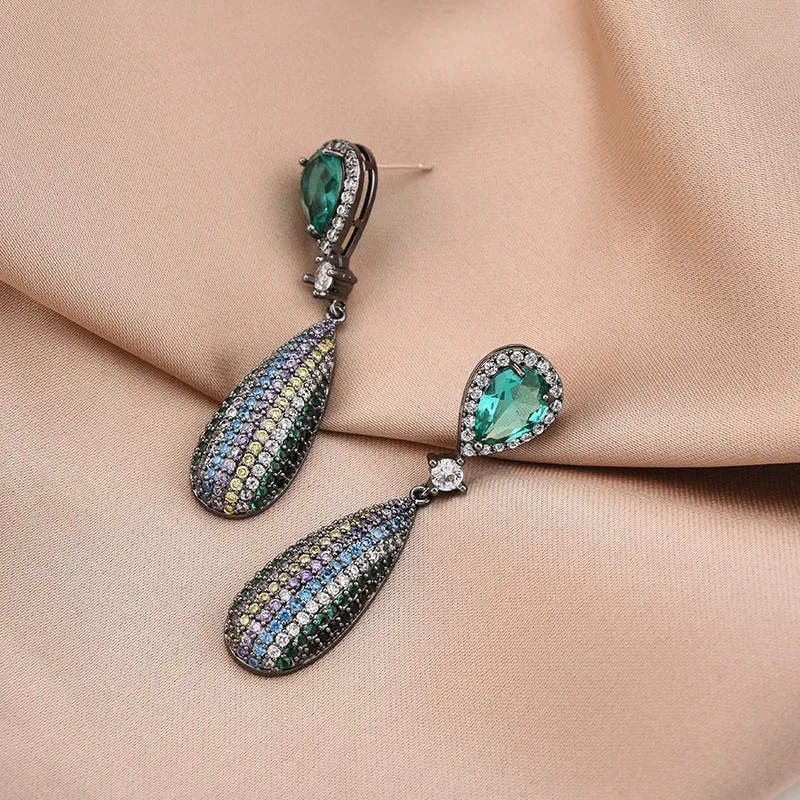 Copper drop shape earrings with inlaid zircon and gold-plated finish in 18K gold colour