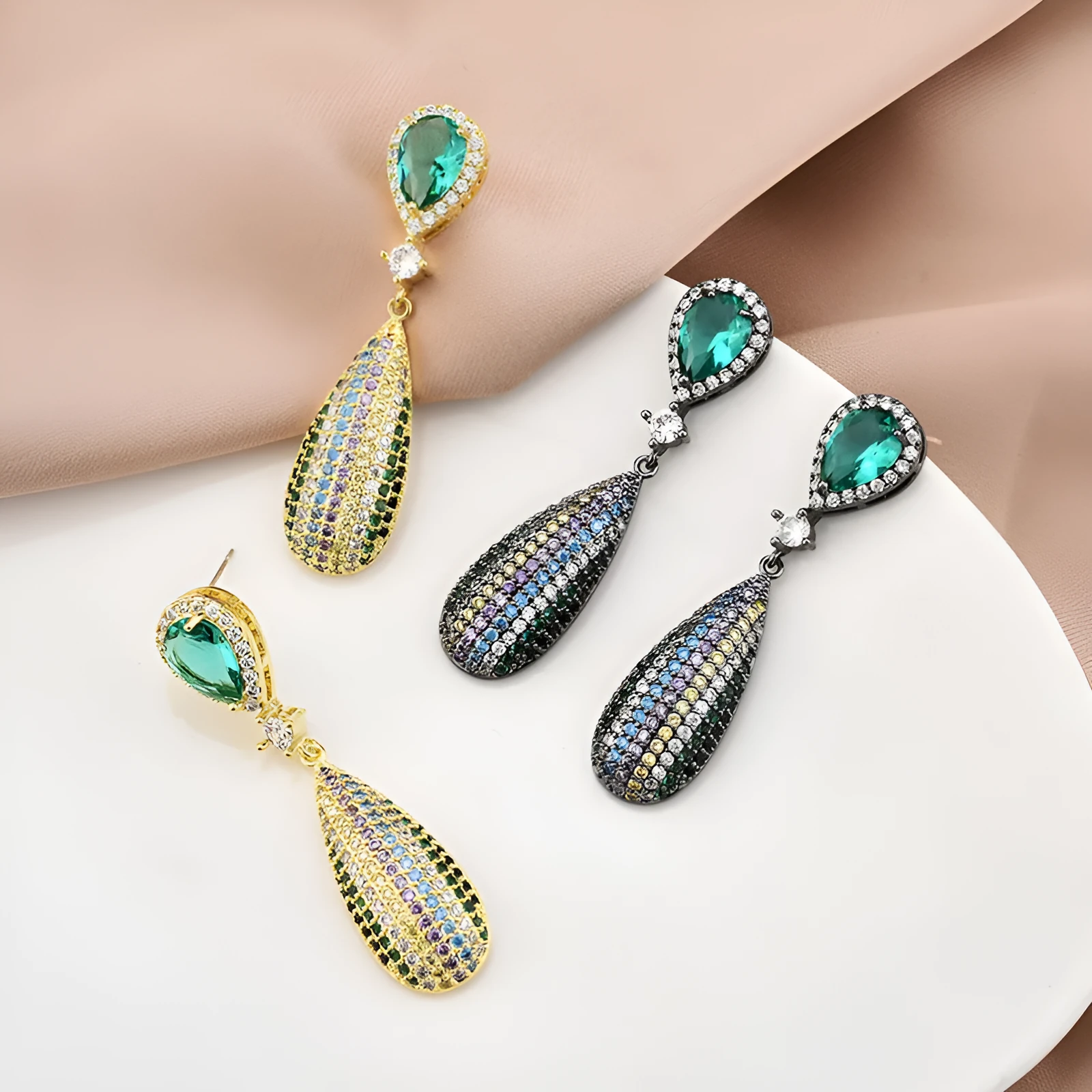 Copper drop shape earrings with inlaid zircon and gold-plated finish in 18K gold colour