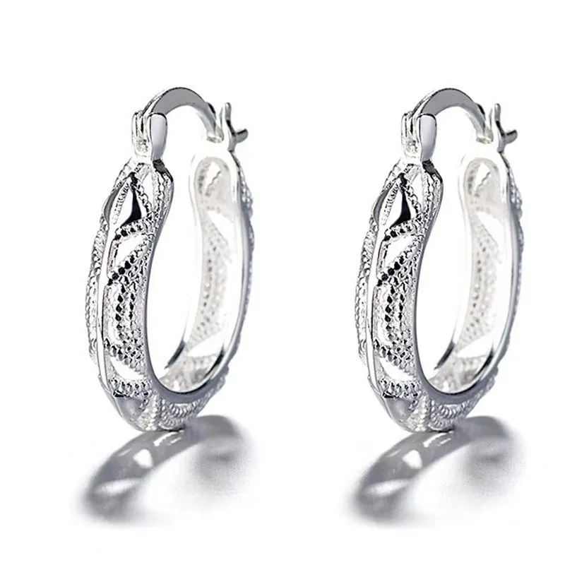 Geometric metal earrings for women with electroplated silver finish, individually packed.
