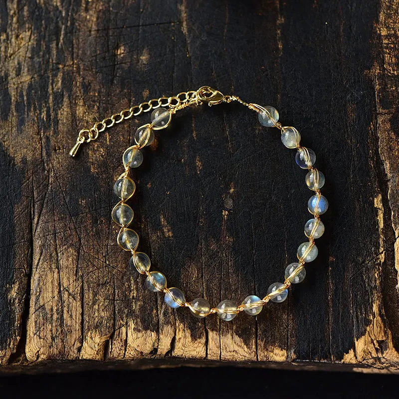 Blue moonstone bracelet with 14K gilded metal celestial design