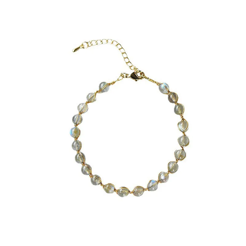 Blue moonstone bracelet with 14K gilded metal celestial design