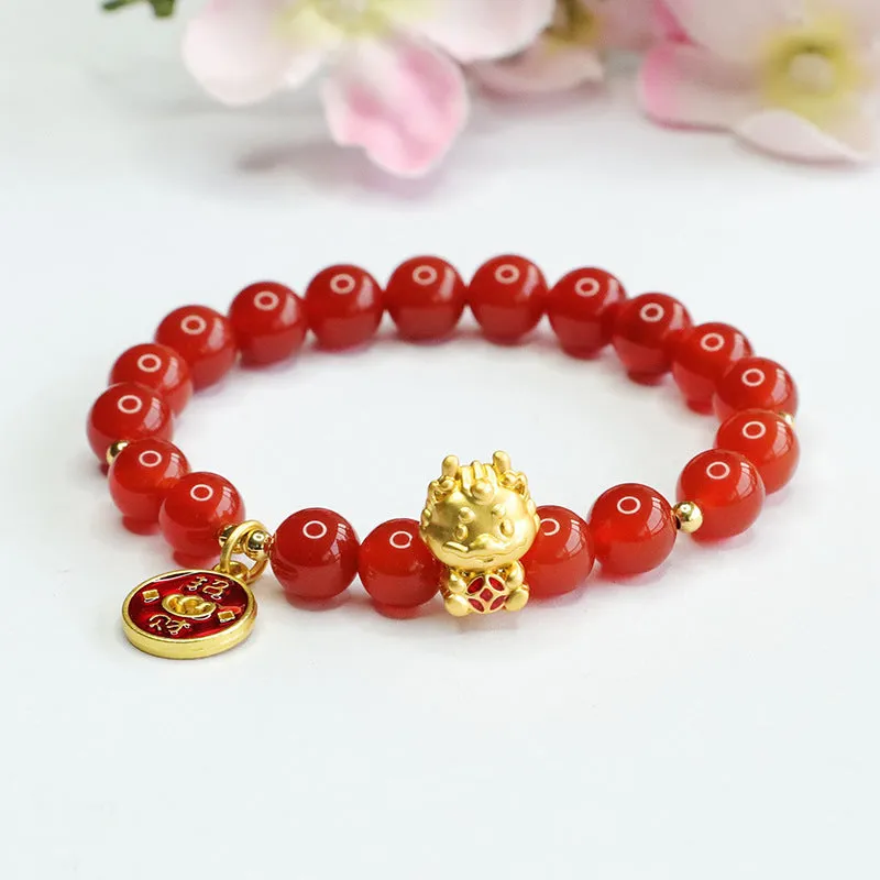 Close-up of a red agate bead dragon zodiac bracelet on a wrist, showing 8mm beads and Chinese style design.