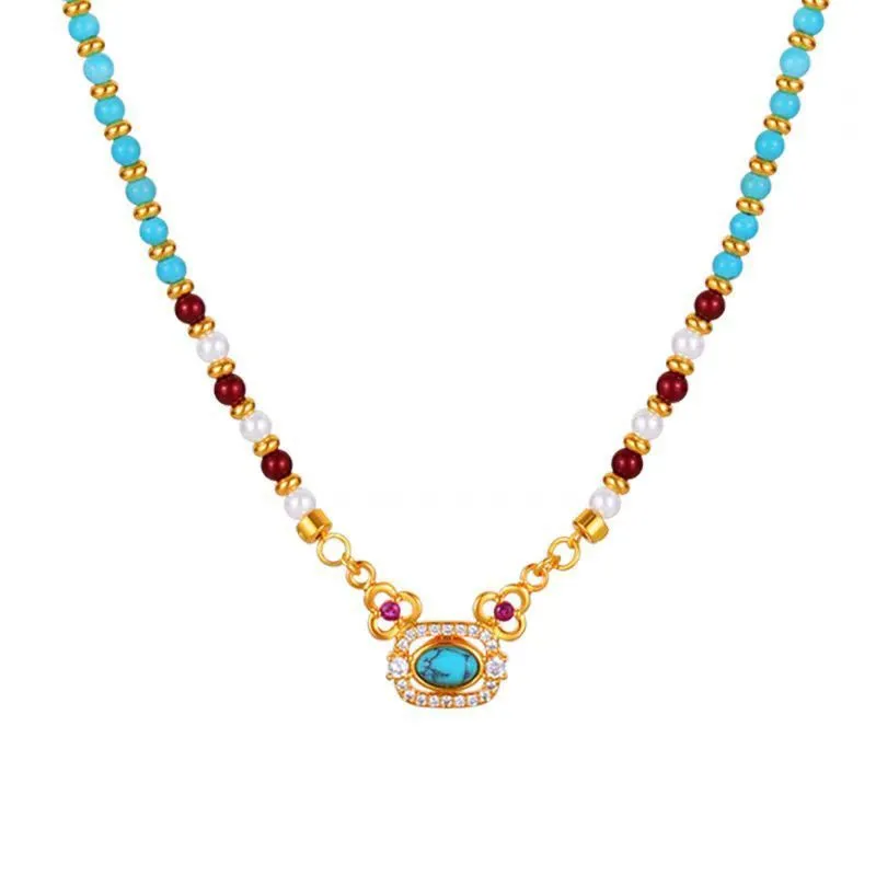 Natural turquoise pearl necklace with gold plated copper chain and matching bracelet on display