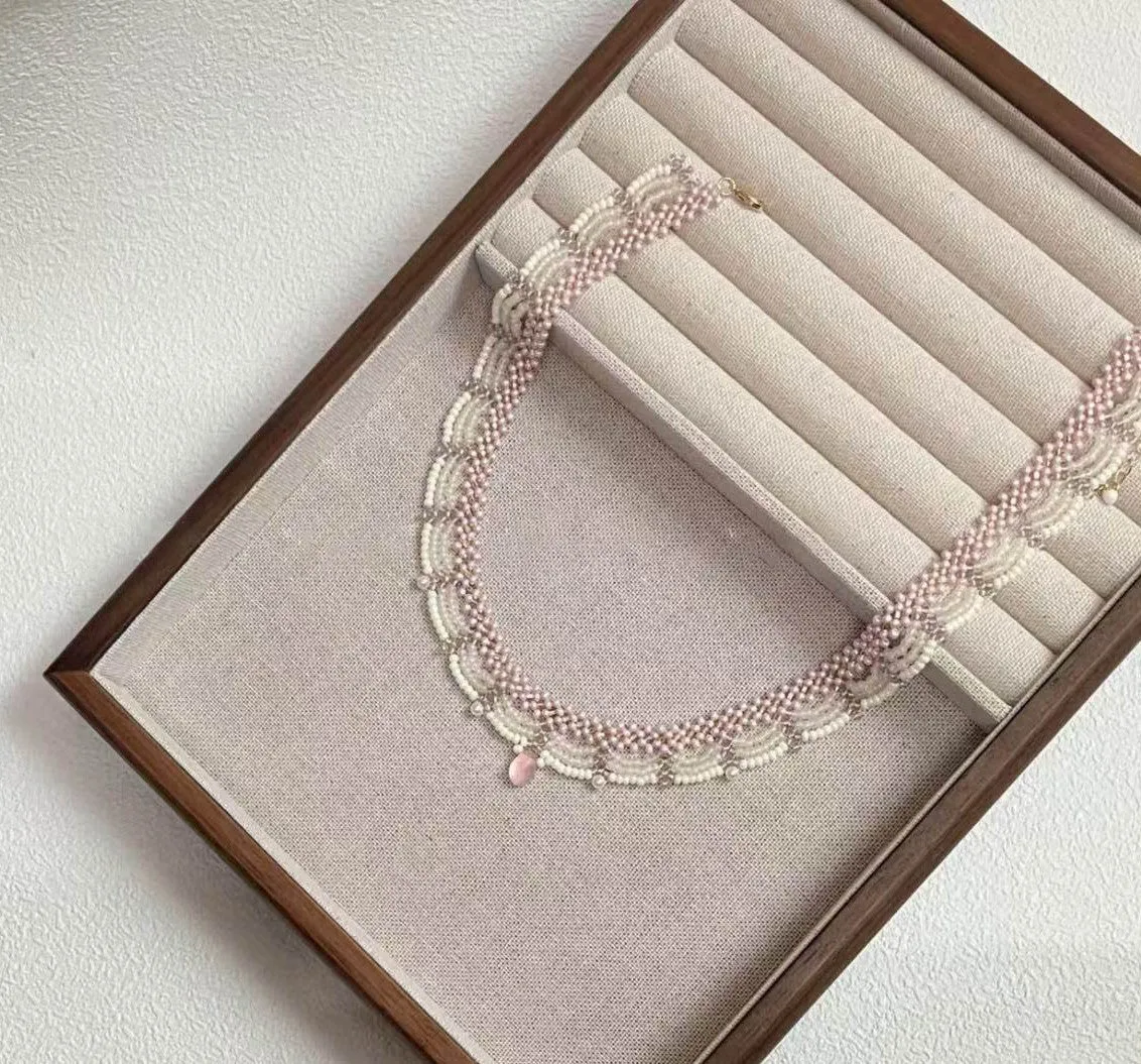 Hand-woven pink glass bead tassel necklace with alloy pendant on regular chain