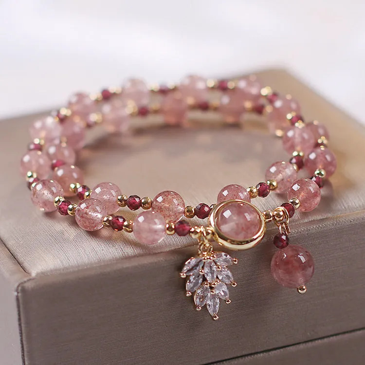 Double layer strawberry quartz bracelet with lucky cat charm in red cat's eye flowers colour