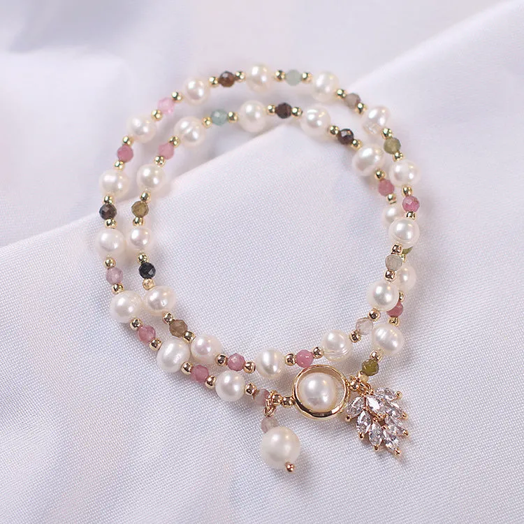 Double layer strawberry quartz bracelet with lucky cat charm in red cat's eye flowers colour
