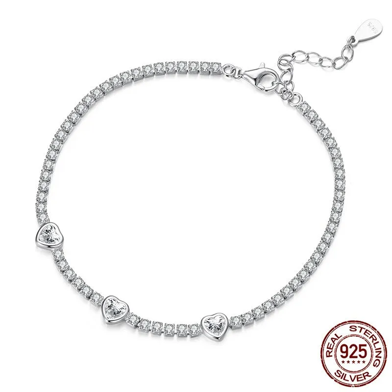 S925 sterling silver bracelet with heart-shaped clear zircon centrepiece on light background