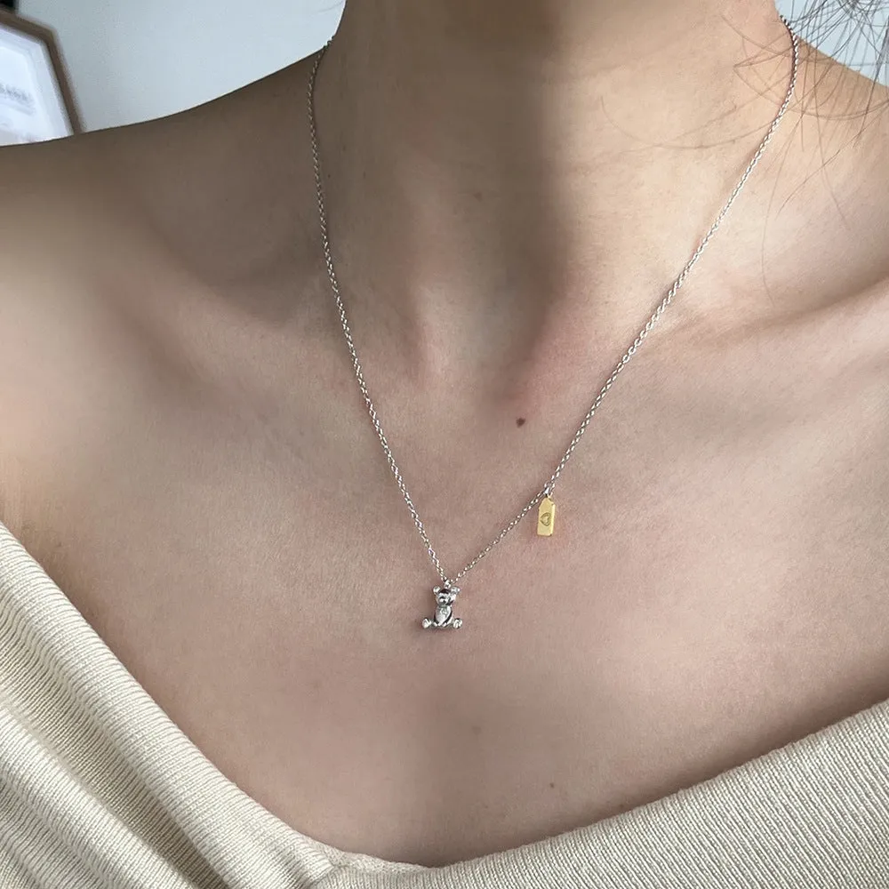 925 silver bear necklace for women with electroplated finish on white background