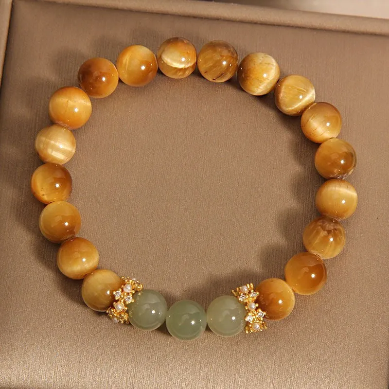 Natural yellow Tiger's Eye Hetian jade bracelet with gold gourd design and U-shaped form