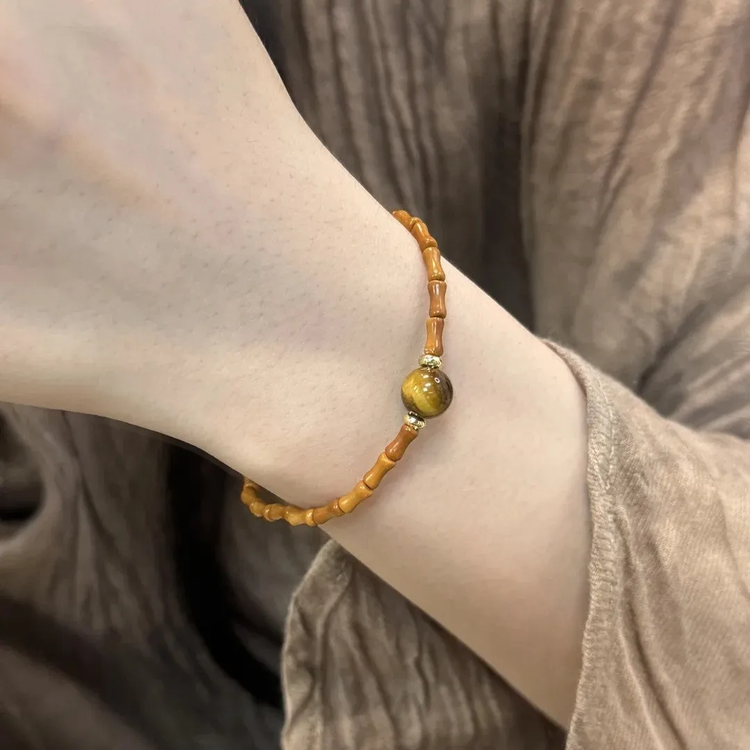 Natural yellow Tiger's Eye Hetian jade bracelet with gold gourd design and U-shaped form