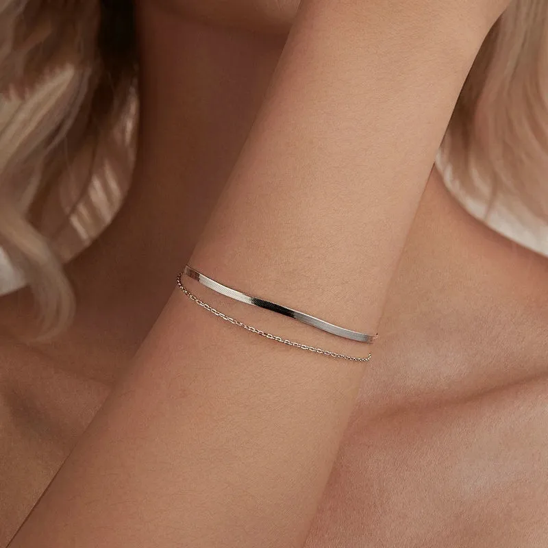 S925 sterling silver double-layer bracelet with electroplated finish, BSB193 colour, on female wrist against neutral background