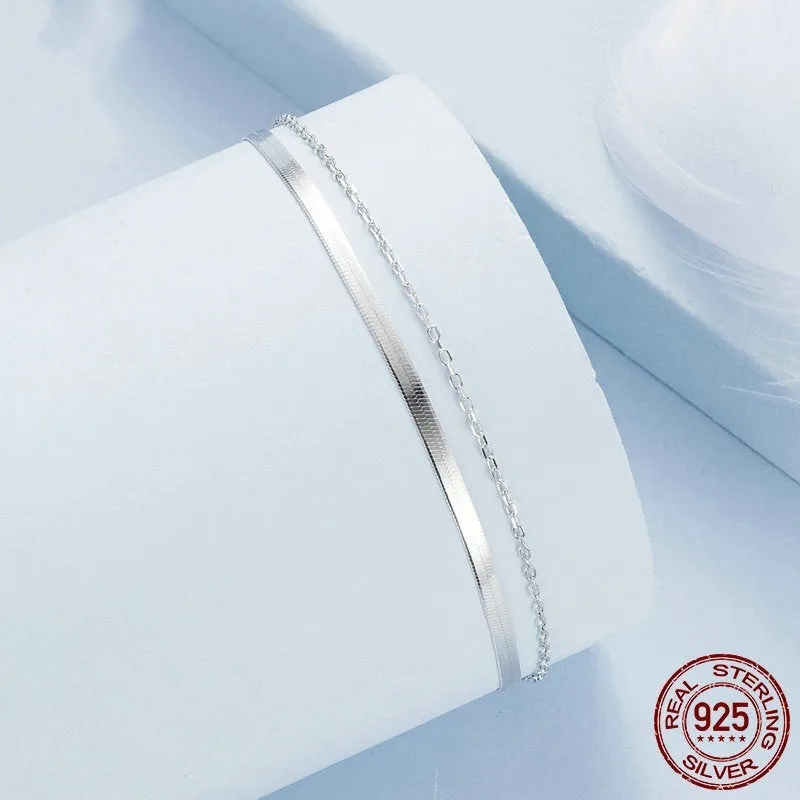 S925 sterling silver double-layer bracelet with electroplated finish, BSB193 colour, on female wrist against neutral background