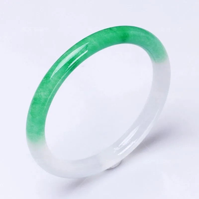 Women's jade bracelet with ice-like emerald appearance and floating flower patterns in multiple colour options